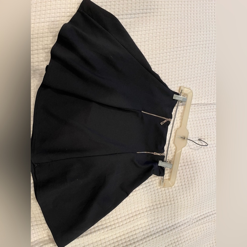 Black skater skirt with golden zippers
